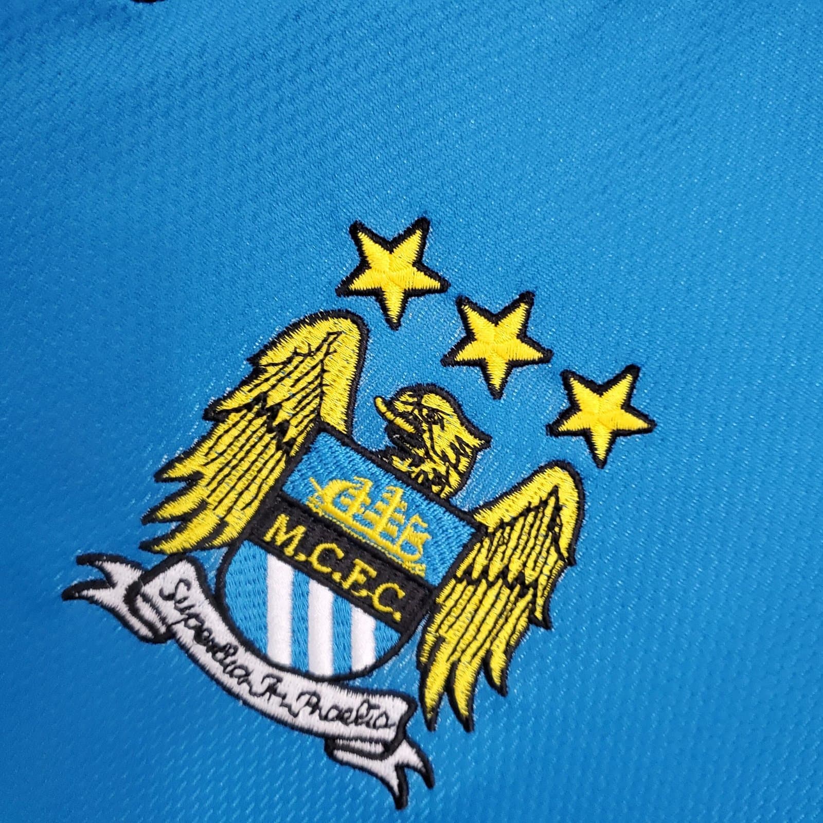 Man. City 1997/99 1a Eq. — detalle